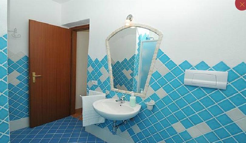 Gallo Spot Hotel Сан Теодоро Стая снимка